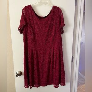 Cocktail length lace short sleeve dress